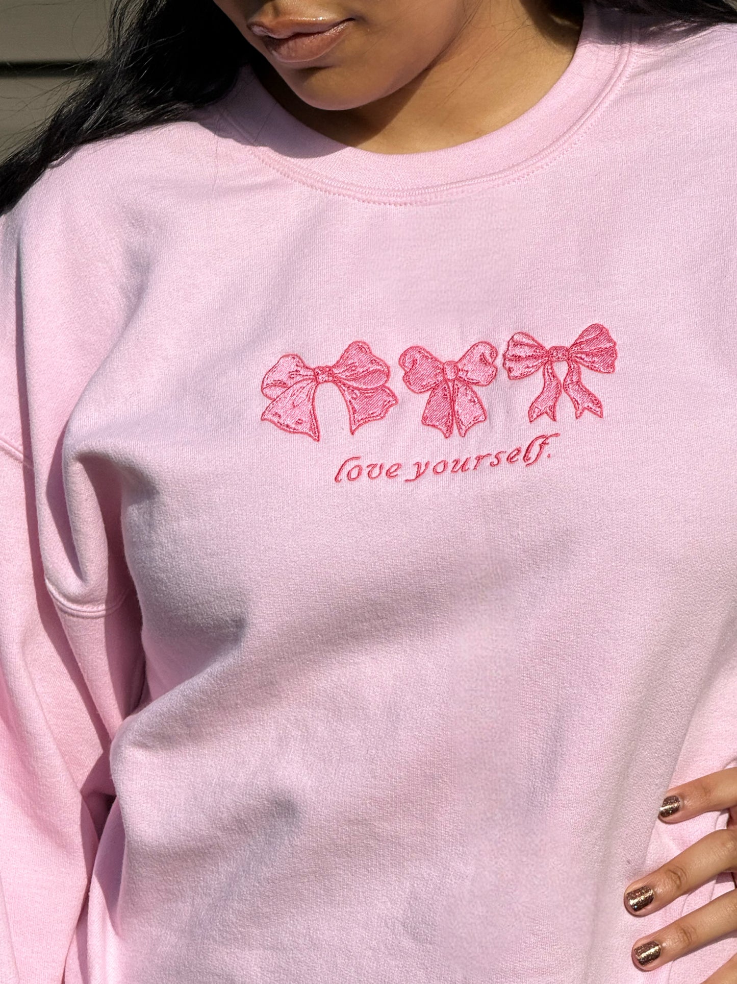 Embroidered love yourself bow crewneck