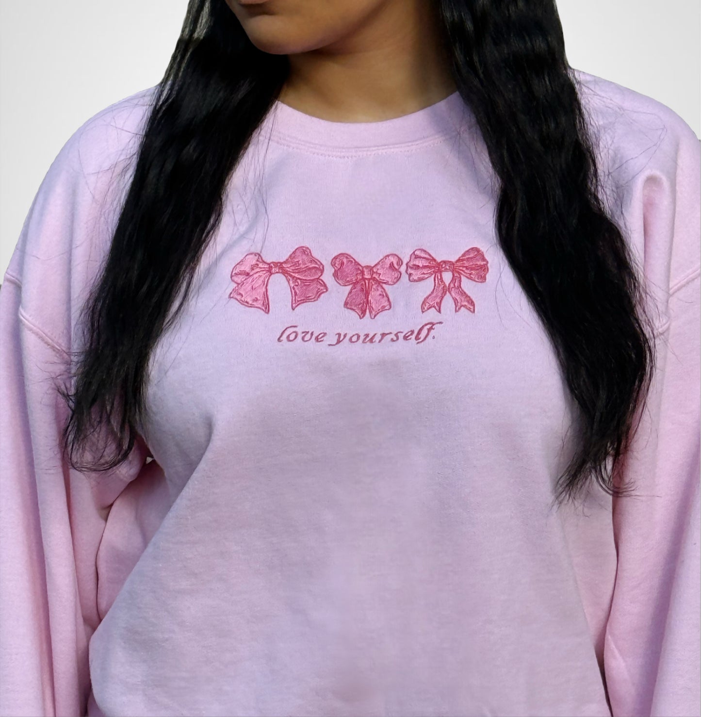 Embroidered love yourself bow crewneck